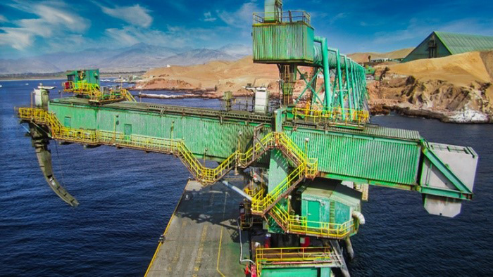 A shiploader positioned at the port.