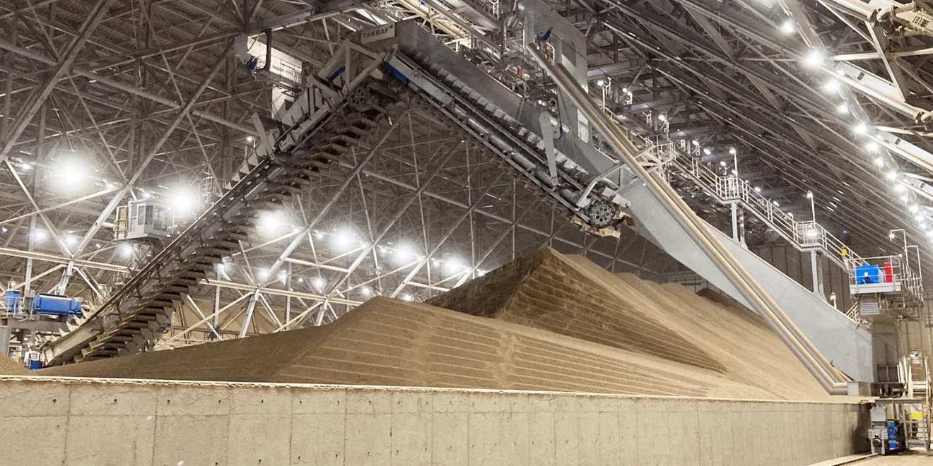 TAKRAF Portal Scraper Reclaimer, multi-commodity, Chubu, Japan A TAKRAF machine, called portal scraper reclaimer in process