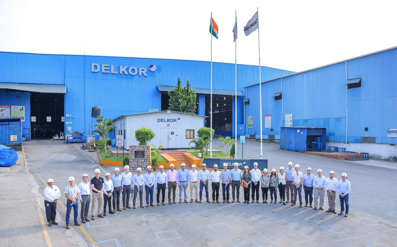 The Senior Management Team of the TAKRAF Group in front of the product and service center in India, near Bengaluru