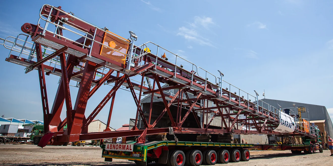 Replacement boom for an ash spreader