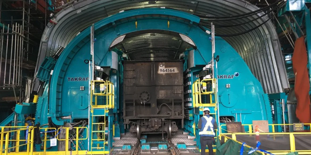 Wagon unloading station with tandem O-type tippler