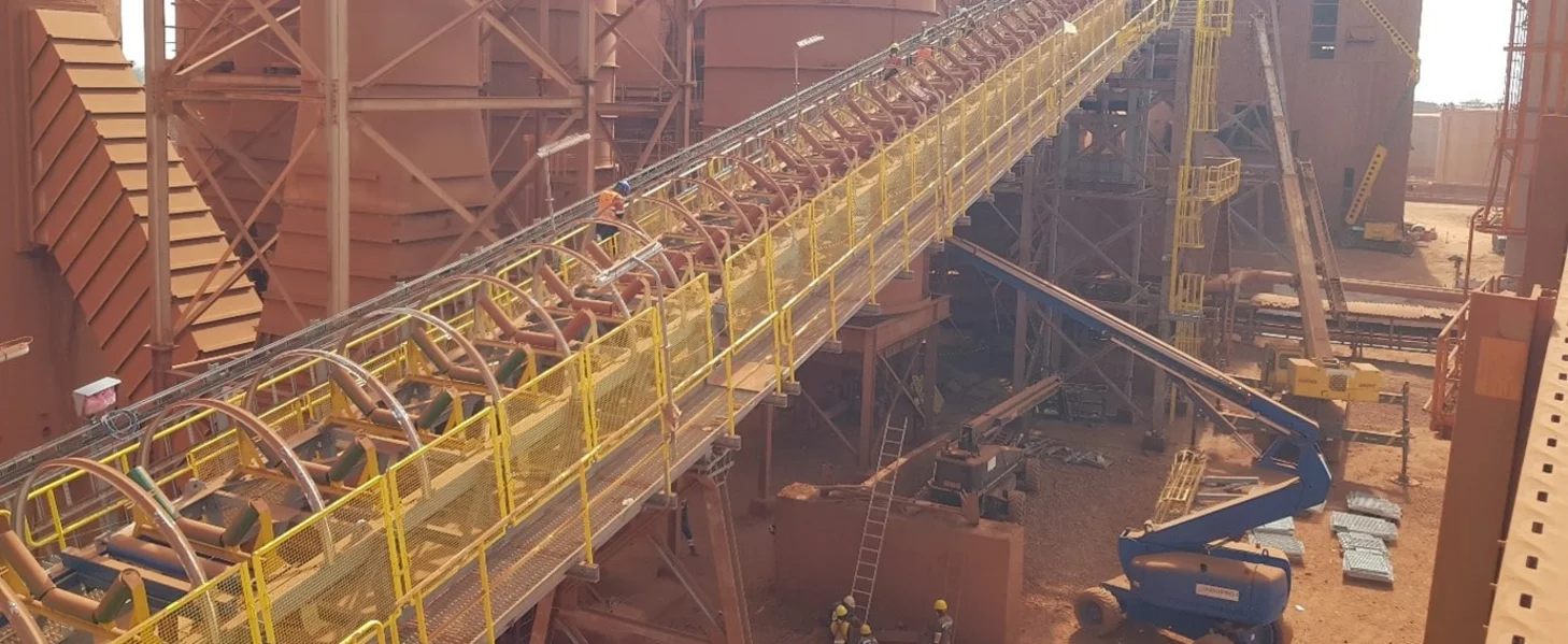 A conveyor being replaced at a brownfield project in Guinea.