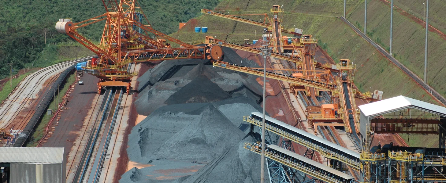 Iron ore material handling system with several stockyards, incorporating TAKRAF Stackers, Reclaimers and Conveyor System