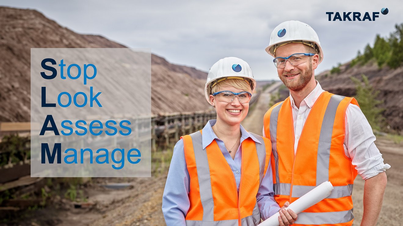 Man and woman in safety helmets an vests standing in front of a construction site, text: Stop, Look, Assess, Manage