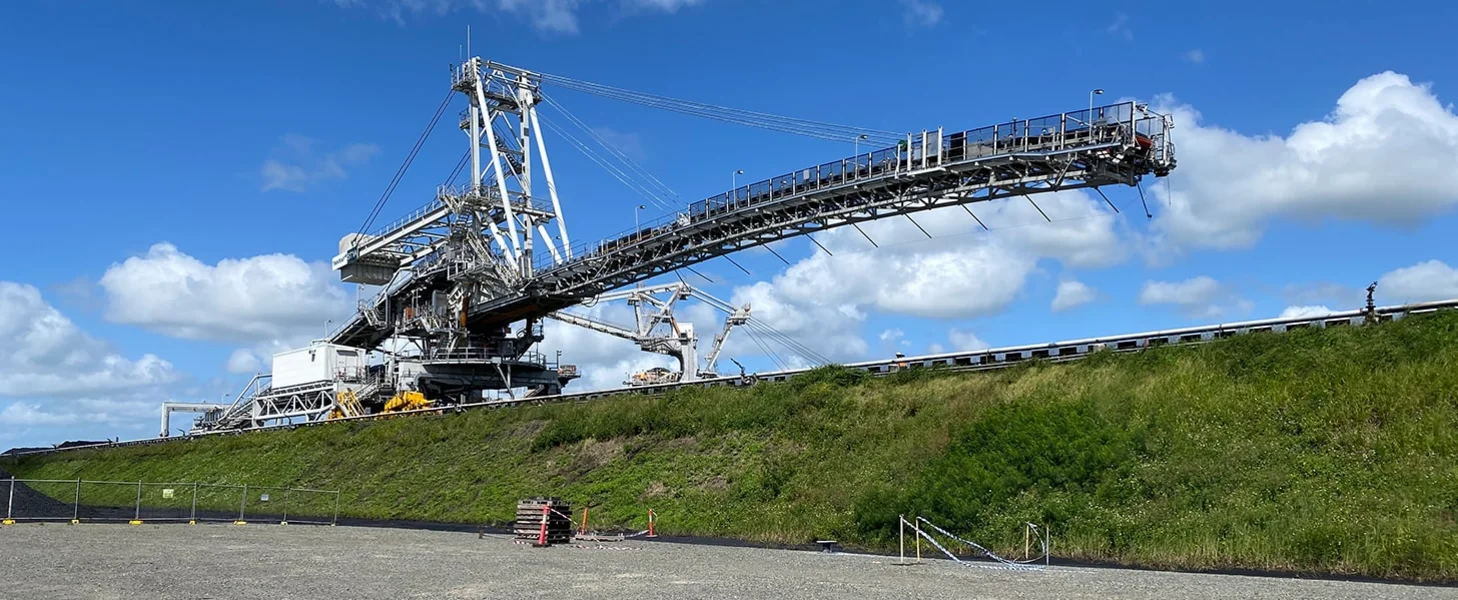 TAKRAF 6,300 t/h Rail-Mounted Stacker for a bulk terminal, Australia.
