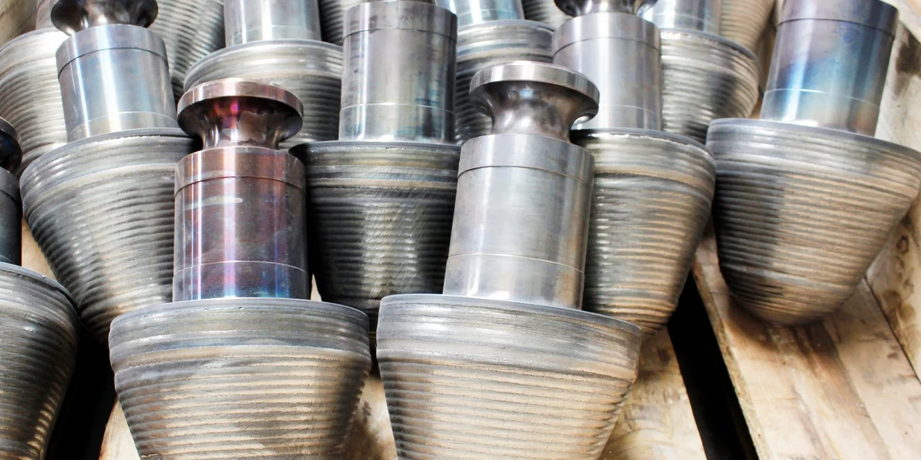 More than ten completed crushing teeth, now waiting to be used in a TAKRAF Sizer.