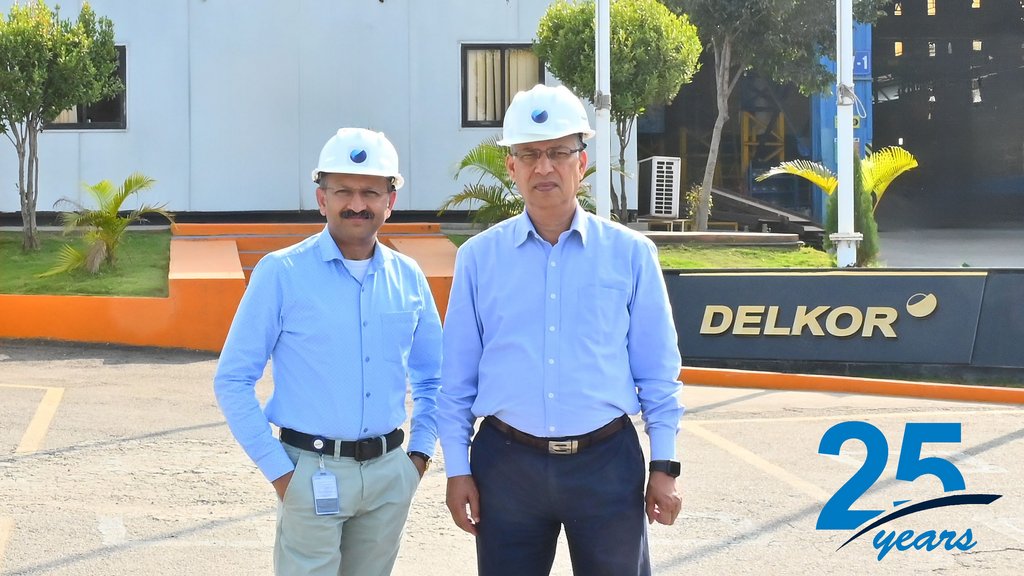 Rajiv Krishnamurthy, Executive Director and Indu Bhushan Jha, Managing Director DELKOR India in front of the DELKOR Product Center in Bengaluru.