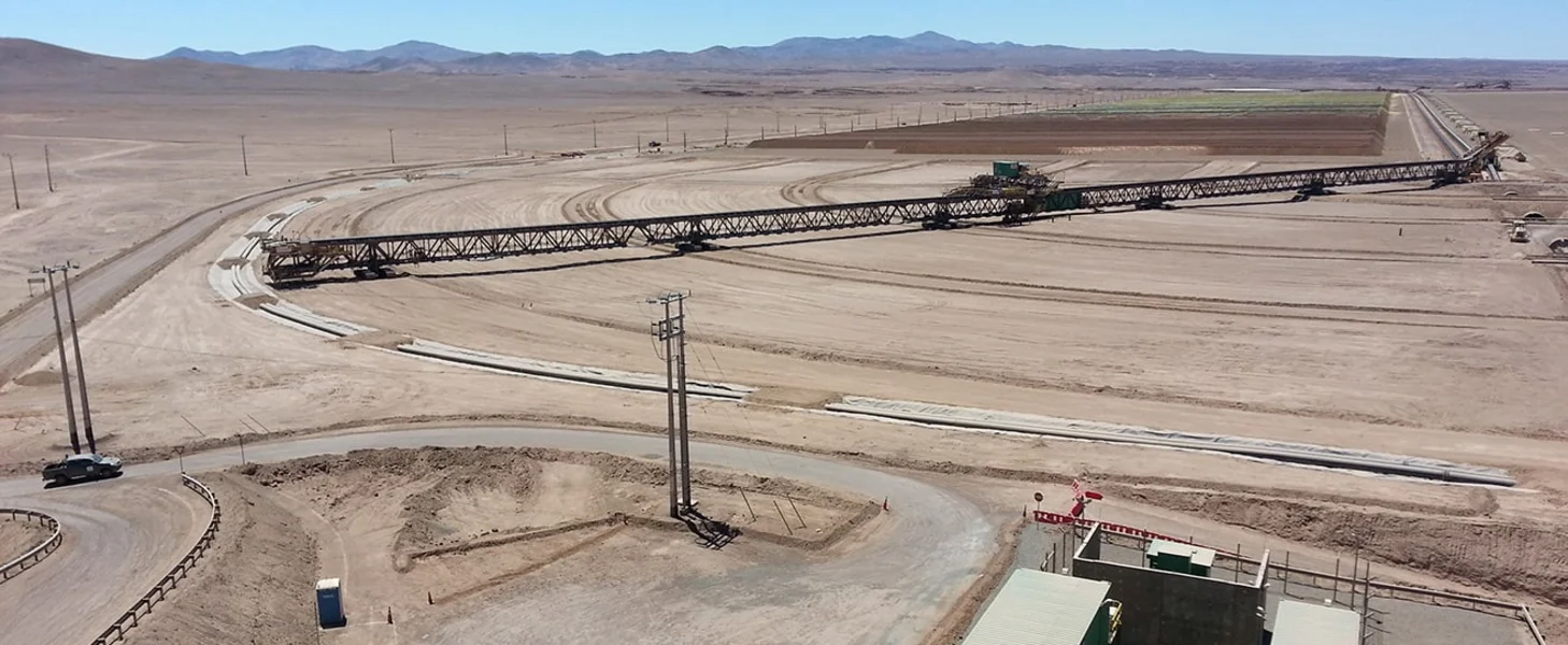 TAKRAF Mobile Stacking Bridge during relocation (u-turn) at an ON-OFF-leach pad.