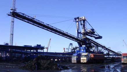 A robust stacker designed for efficient coal handling at a seaport terminal