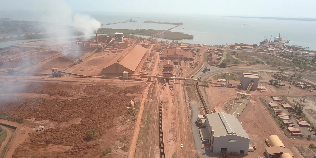 A railcar unloading and crushing and conveying system in Guinea.