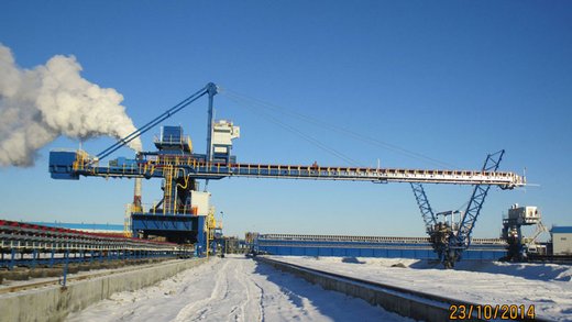 A powerful stacker designed for efficient iron ore handling