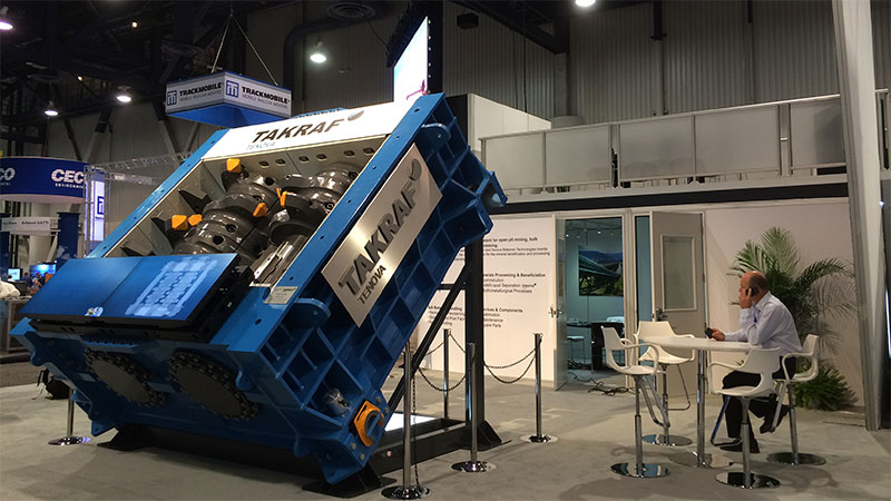 TAKRAF booth at MINExpo with a sizer on display